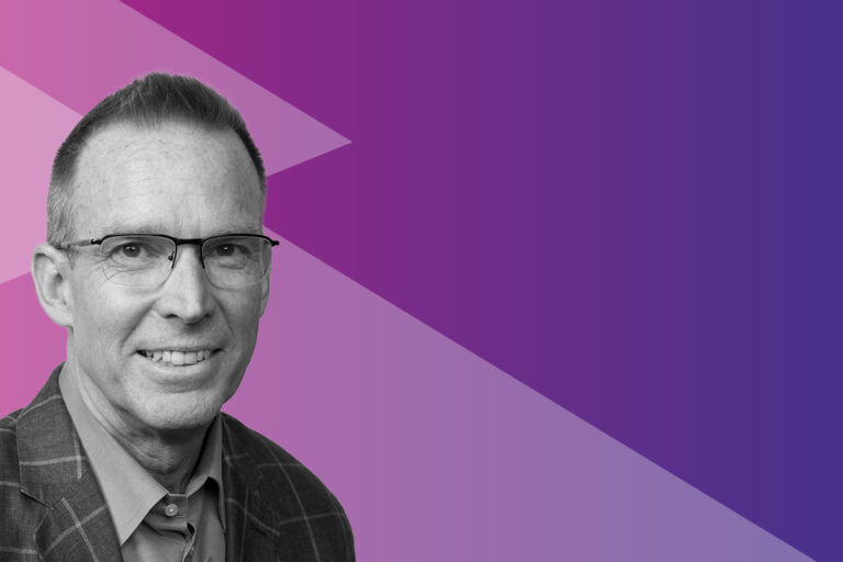 A man wearing glasses and a checked jacket smiles in the lower left corner. The background features a gradient of purple shades with geometric shapes.