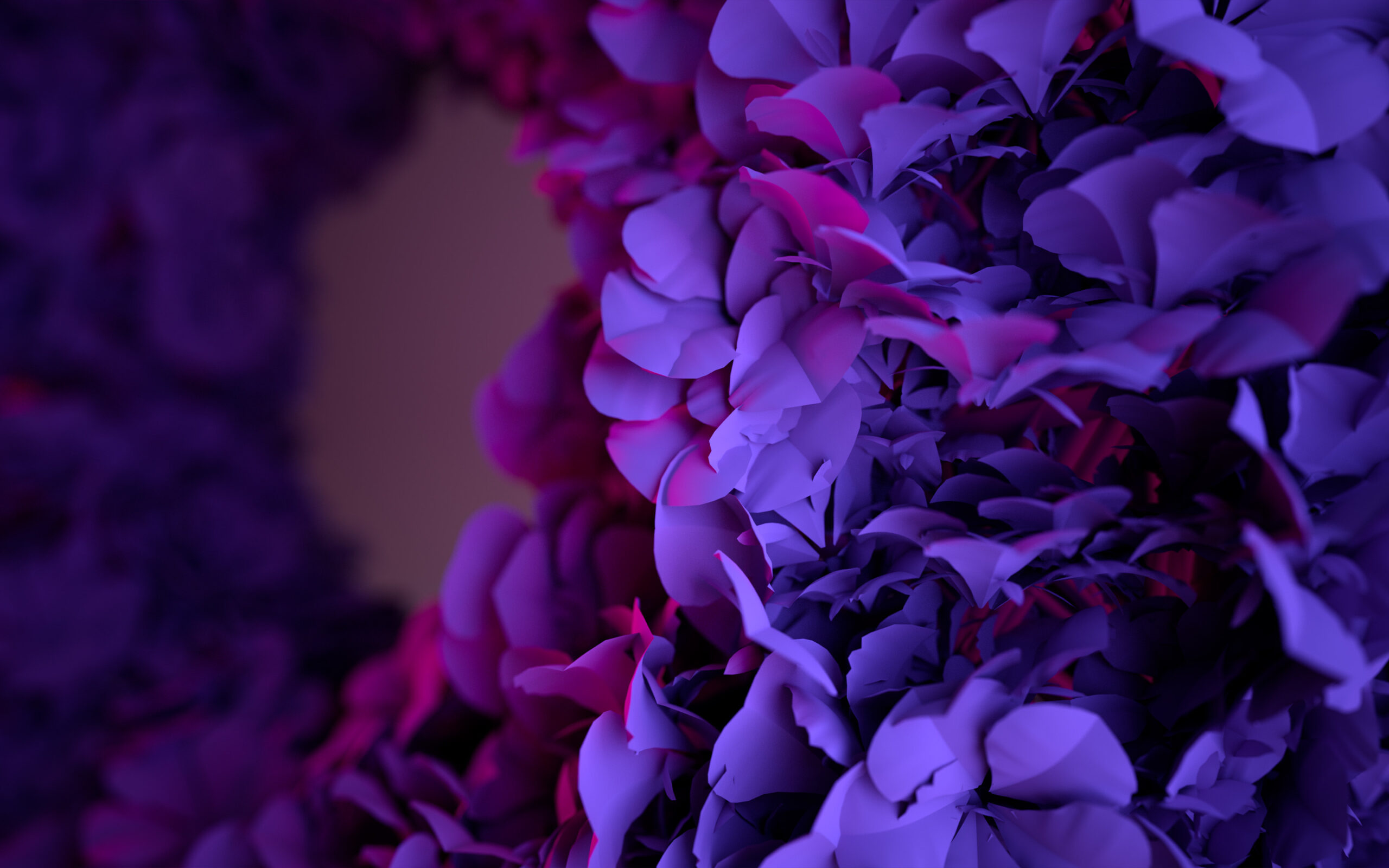 Purple and pink artificial flower petals clustered closely together with soft lighting, creating a vibrant, dreamy, and abstract floral pattern.