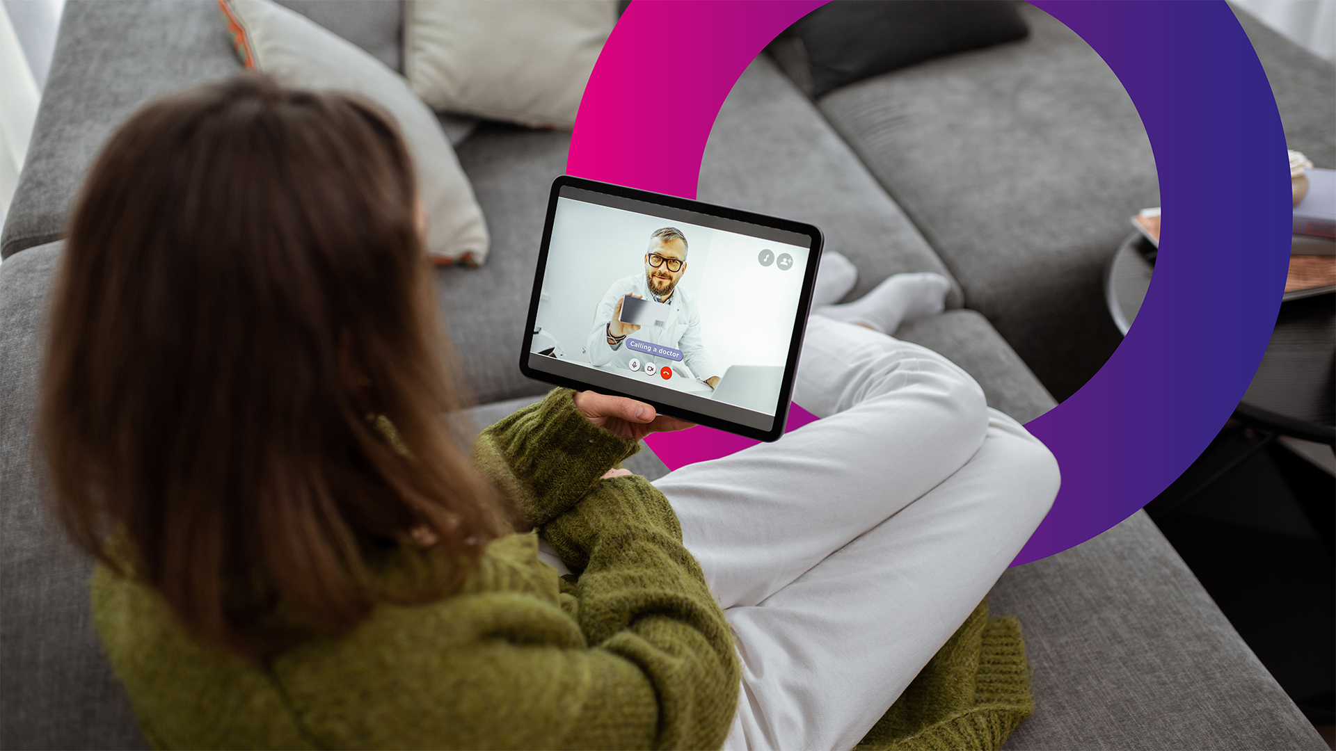 A woman sits on a grey sofa holding a tablet, video chatting with a doctor. Colourful, semi-transparent circles overlap the image.
