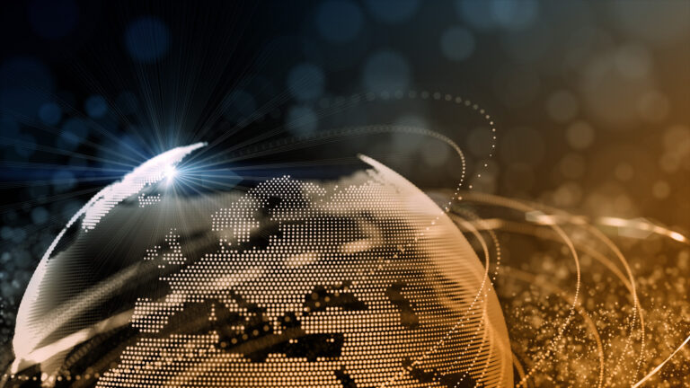 A digital globe with illuminated continents and glowing lines, representing global communication and technology, on a dark background with bokeh light effects.