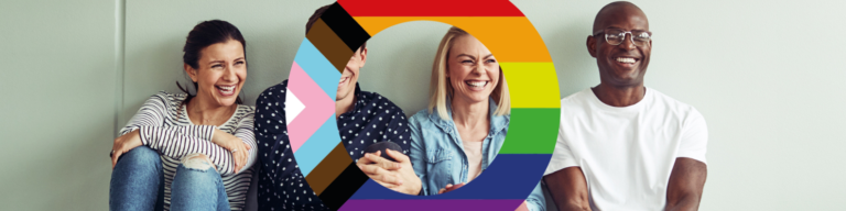Four people sitting and smiling in front of a wall, with a large, partially transparent Progress Pride flag symbol overlaid in the centre of the image.