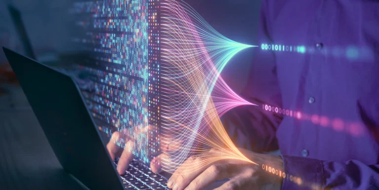 A person typing on a laptop with colourful digital lines and binary code graphics overlaid, representing data processing or artificial intelligence technology.
