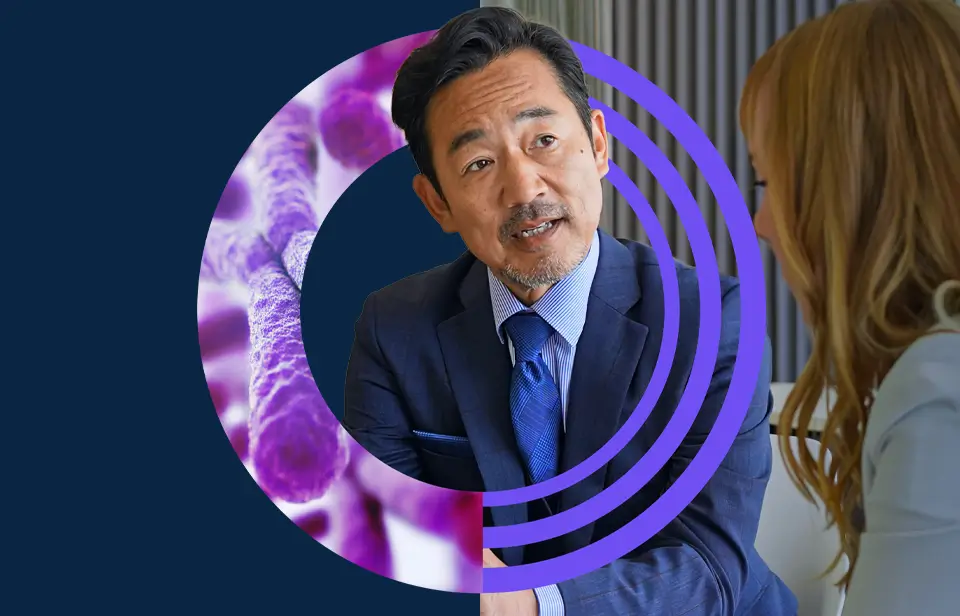 A man in a suit in conversation with a colleague, framed by purple rings and a cell imagery illustration.