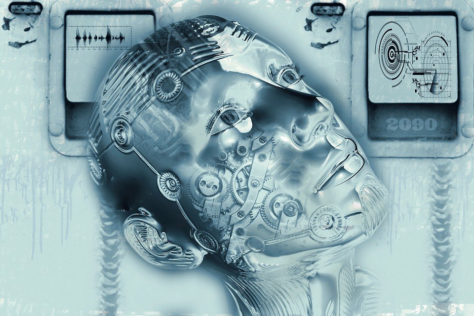 A futuristic illustration of a metallic humanoid robot head with visible gears and circuits, set against a blue background with digital panels and technical graphics.