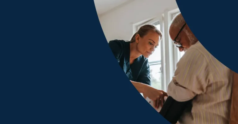A healthcare worker measures an older man's blood pressure in a bright room. Both are focused on the task. The image is partly covered by a dark blue graphic design.