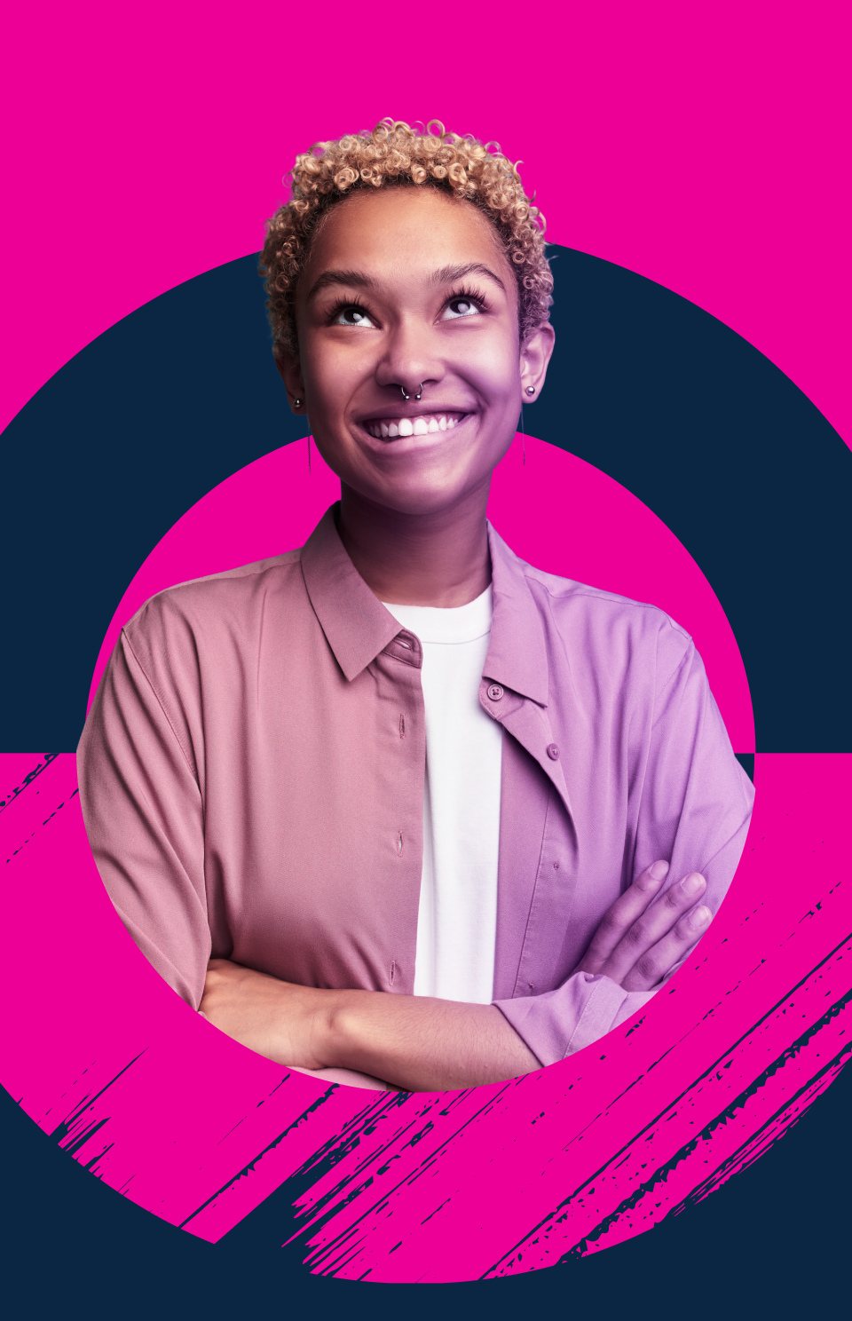 Person with short curly hair, wearing a pink shirt over a white top, smiling with arms folded, looking upwards. Background is vibrant pink with dark blue graphic elements and brush strokes.